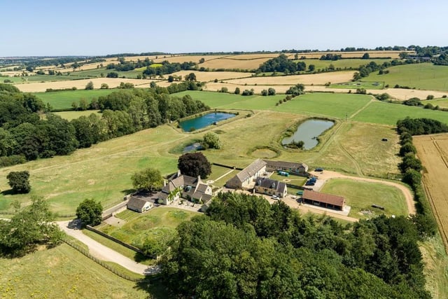 This Grade II listed country estate boasts its own parkland grounds which extend across approximately 30 acres, and include stables, woodland and four lakes, with panoramic views across the Welland Valley. Price: £4,950,000.