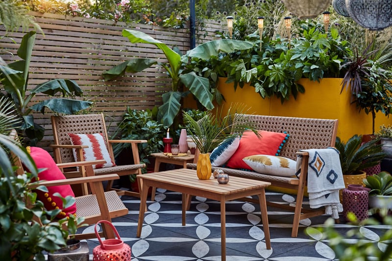A celebration of colour, with sunshine shades of apricot orange and tropical greenery to create a garden getaway. A craft homespun look, using soft materials, printed tiles and decorative patterns.