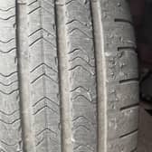 One of the tyres on Jason Newton's Mercedes car, which he says have been 'shredded' due to what the manufacturer has called a known 'characteristic'