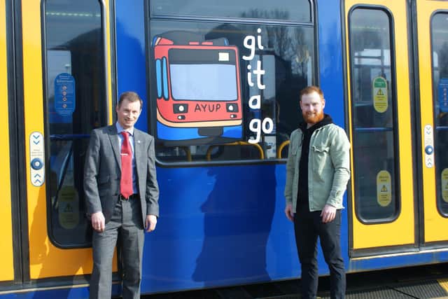 Tim Bilby, managing director of Stagecoach Supertram, with Sheffield artist Luke Horton, who created the designs