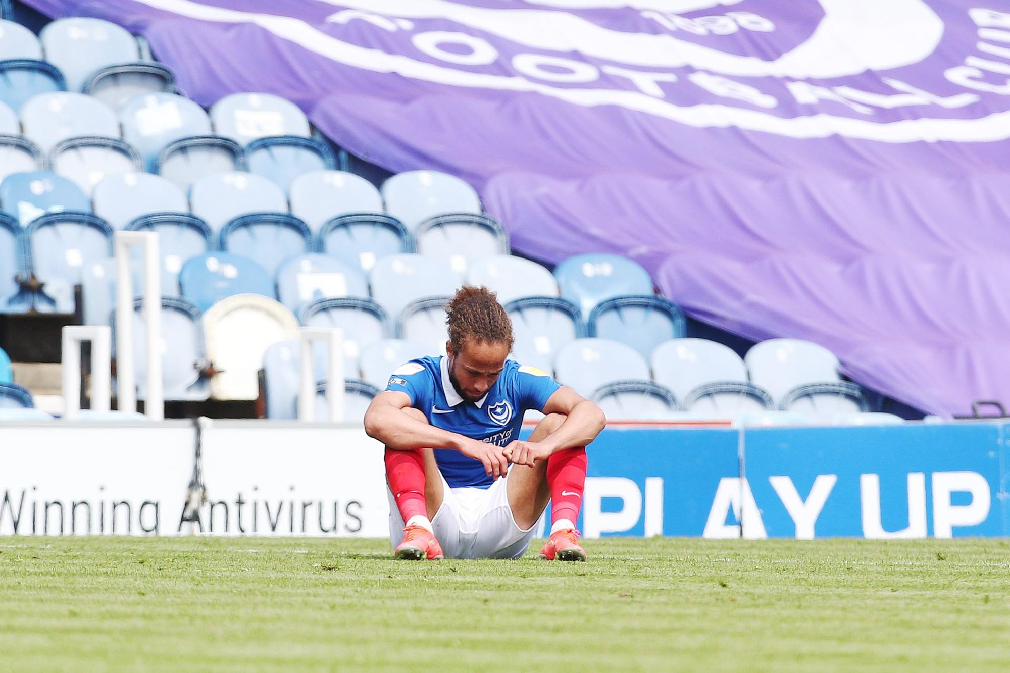 Marcus Harness dejected after the match