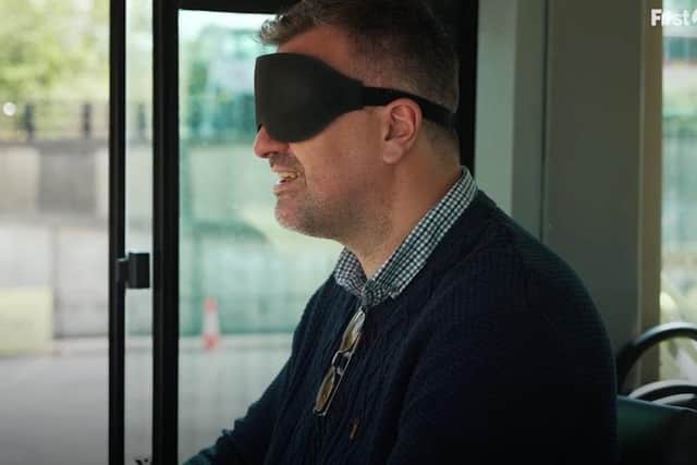 Blindfold Jon McClure can be heard saying: "I'm moving aren't I?" when the bus actually stopped.