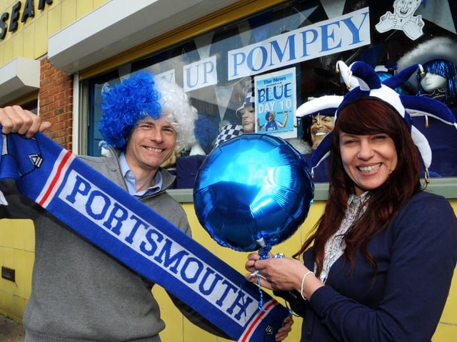 Steve Searle and Sarah Wellham of U Need Us outside their store for Blue Day, a fundraiser run by The News in aid of the Tom Prince Cancer Trust