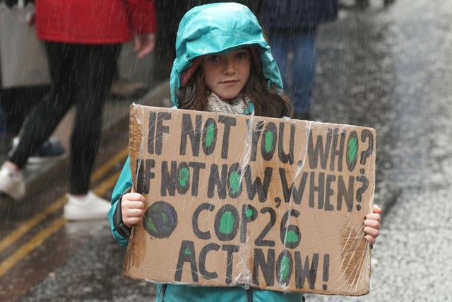 A child protester calls for action now (Getty Images)