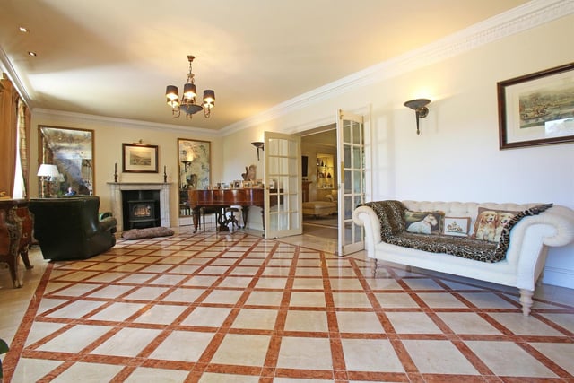 Stunning floors complement this reception room