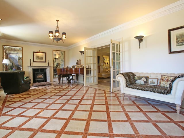 Stunning floors complement this reception room