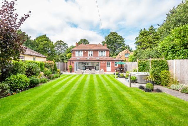 Four bedroom detached house with immaculate landscapted gardens