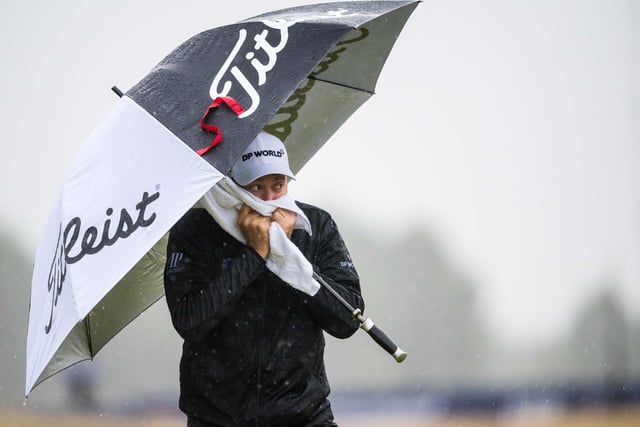 Ian Poulter standing in the rain during the Aberdeen Standard Investments Scottish Open (day three) at the Renaissance Club on October 3 in North Berwick, Scotland.