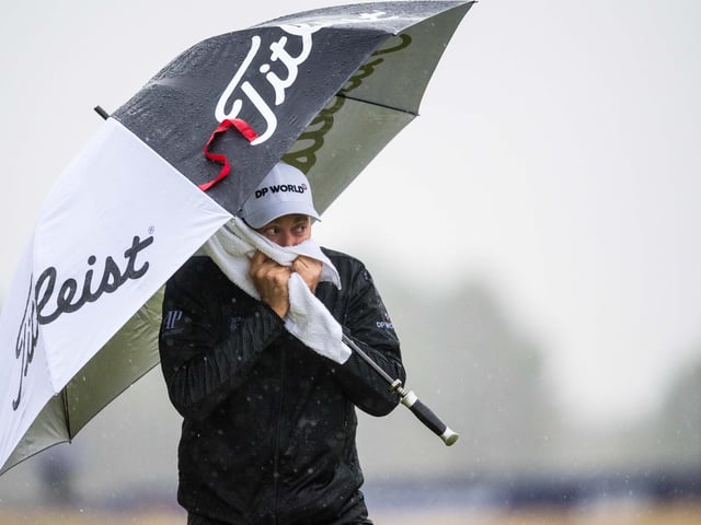 Ian Poulter standing in the rain during the Aberdeen Standard Investments Scottish Open (day three) at the Renaissance Club on October 3 in North Berwick, Scotland.