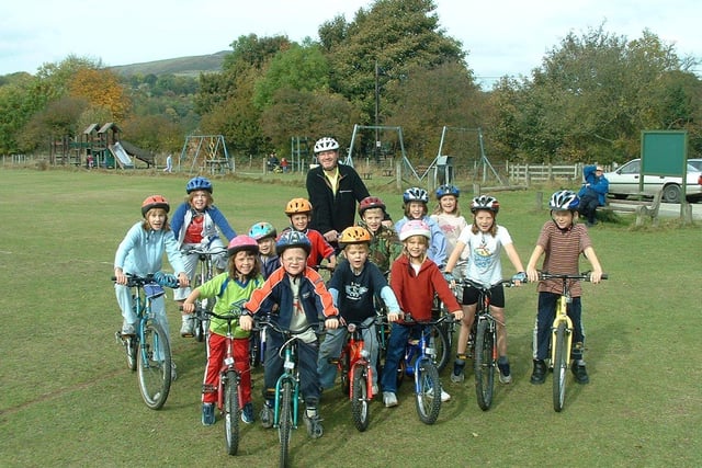 Children from Bamford Primary School in the Hope Valley completed a sponsored cycle relay, raising over £1,700 for the Macmillan Cancer Relief Charity back in 2003
Andy Evans with some of the children from Bamford Primary School who took part in a 400km sponsored cycle relay.