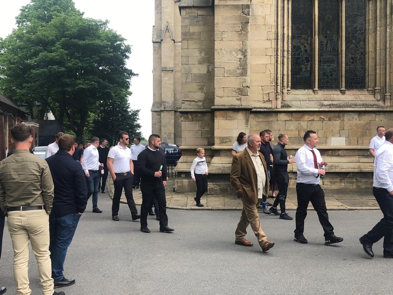 Many people followed the hearse on foot
