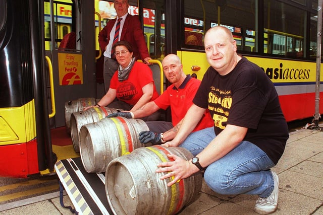 Pictured on Pond Street, Sheffield in 1998 where one of the New low floor easy acces Mainline buses was delivering beer barrels to the Steel City Beer and Cider Festival to be held at the Nelson Mandela Building. Seen  is driver Barry Sheedy. Unloading LtoR are, Linda Hutton, Craig Smith, and Dave Owen.