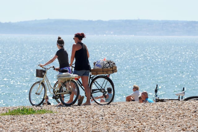 People flocked to the seafront on Thursday, May 21 - the hottest day of the year. Picture: Sarah Standing (210520-2514)