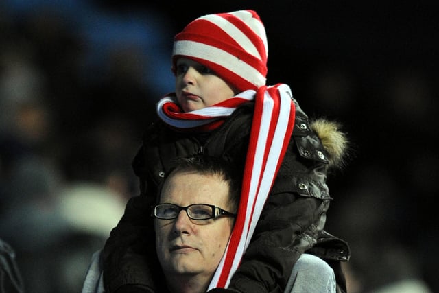 A young Blades fan out well past his bedtime at Coventry in March 2009