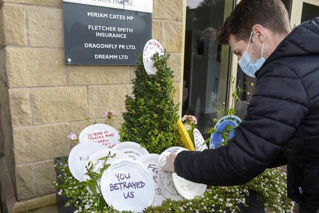 Campaigners put plates outside the constituency office of Conservative MP Miriam Cates in Stocksbridge, Sheffield in protest at her voting against free school meals for children during the holidays