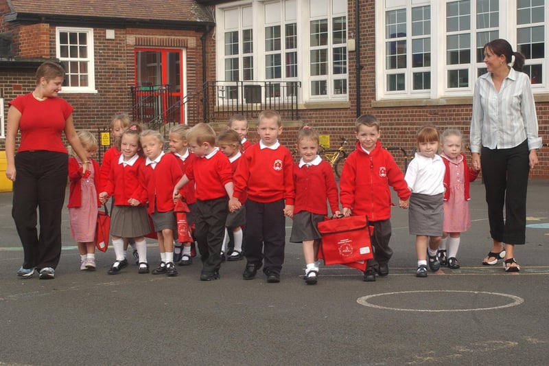 Kerry Reay and Michele Gilbert were taking the new starters for a tour around Marsden Primary School in this photo from 2004.