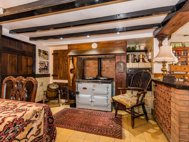 The dining room has a Aga cooker.