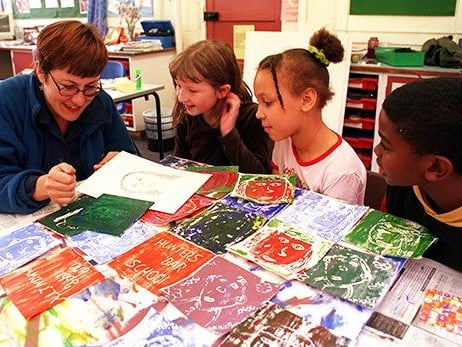 Pictured during the 1998 art in the community project at Hunters Bar Junior School, is artist Helen Parrott with pupils, from left, Frances Whydle, Alanna Linkhorn and Jonathan Pinnock