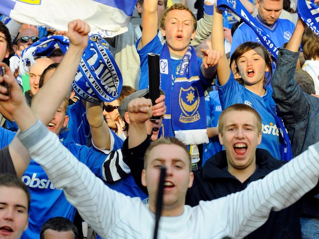Pompey fans celebrate the win.