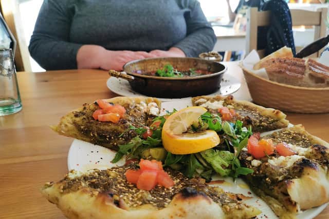 Menakesh, a pizza-like flatbread dish, served at Zaatar's Middle Eastern cafe in Abbeydale Road, Sheffield