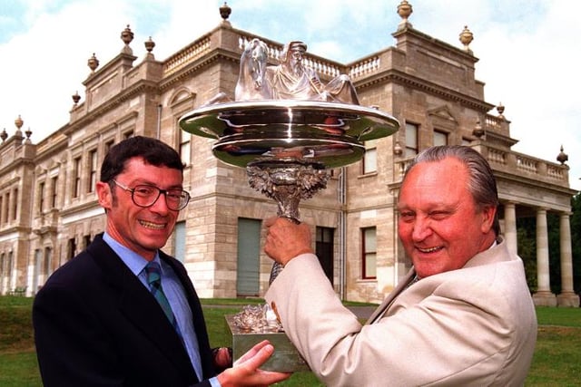 Ronald Williams hands over the Goodwood cup to Peter Gordon Smith in 1996.