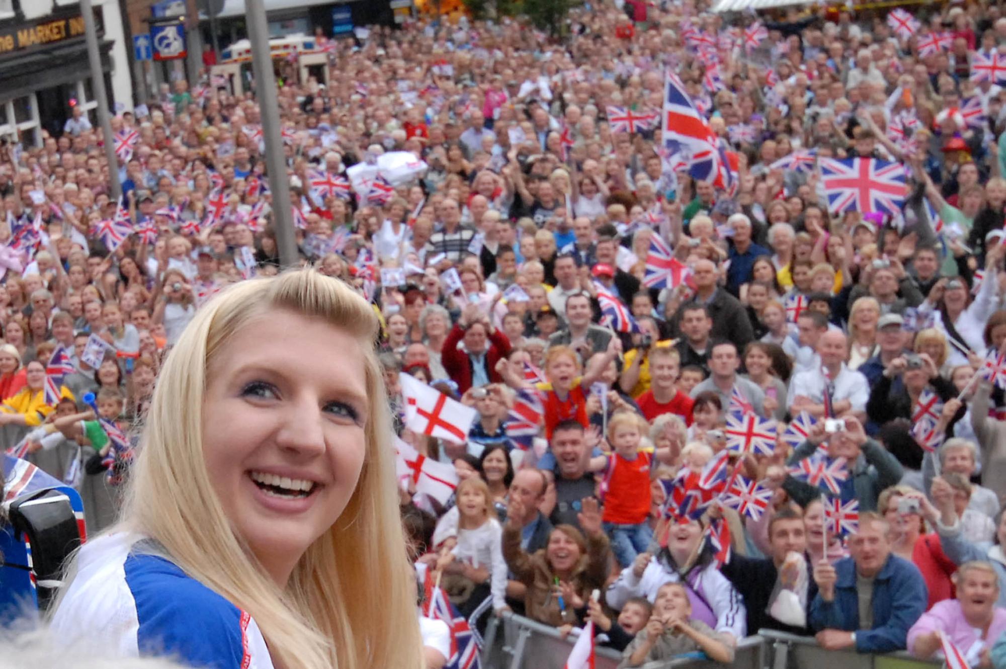Rebecca posing with thousands of fans