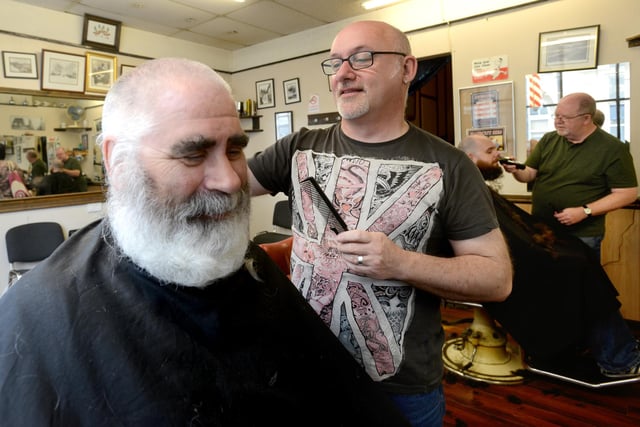 Michael Roper and son Michael were having their beards shaved off in aid of BLESMA and Cancer Research in 2014 and here they are at Johns hairdressers, Norfolk Street, with hairdressers Steve Lounton and Mick McDonough. Does this bring back memories?