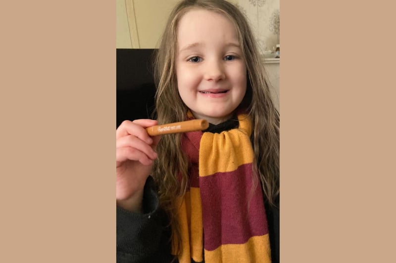 A magic picture of Kara, age 5, dressed as Hermione Grainger from Harry Potter.