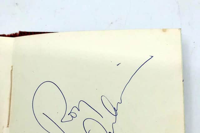 Pamela Timson's Roy Orbison autograph.  A gesture of goodwill by a mystery member of The Beatles could earn a Nottinghamshire woman thousands of pounds as she prepares to part with treasured musical memories from the 1960s.  See SWNS story SWMDbeattles.  The Fab Four were so new on the music scene in 1963, Pamela Timson hadn’t worked out which Beatle was which when one popped out from a backstage door at the Granada Theatre in Mansfield, Notts 57 years ago.  Pamela, then just 12, used to hang out there with friends and other young music fans in the hope of gaining autographs. When a musician or singer appeared, they’d all thrust their autograph books up in hope. Her book was among a few whisked away by the unknown Beatle. It was returned to her shortly afterwards with a full set of Beatles signatures - Paul McCartney, George Harrison, John Lennon and Ringo Starr.  Now Pamela’s autograph book, which boasts other 1960s musical legends including Adam Faith, Roy Orbison and The Walker Brothers, is due to go under the hammer at Hansons Auctioneers on July 21 with a guide price of £3,000-£4,000.