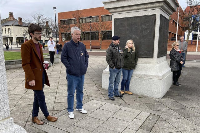 Members of the public and service veterans paused for the silence around the war memorial.  Picture by FRANK REID