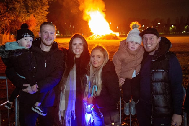 Friends and family in front of the bonfire