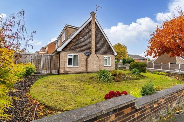 The £300,000-plus bungalow from another angle. It shows the pleasant, enclosed garden.
