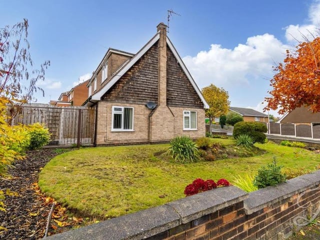 The £300,000-plus bungalow from another angle. It shows the pleasant, enclosed garden.
