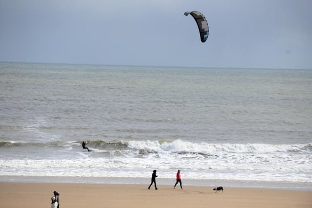 A kite surfer catches the breeze