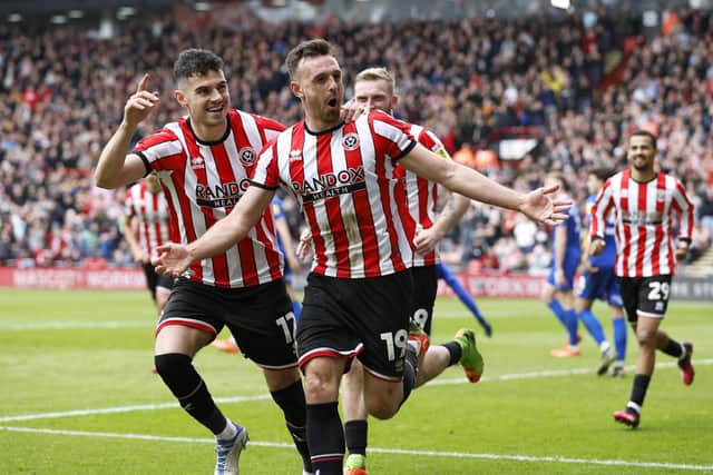 Sheffield United's Jack Robinson (centre) celebrates scoring their side's second goal of the game during the Sky Bet Championship match at Bramall Lane: Richard Sellers/PA Wire.