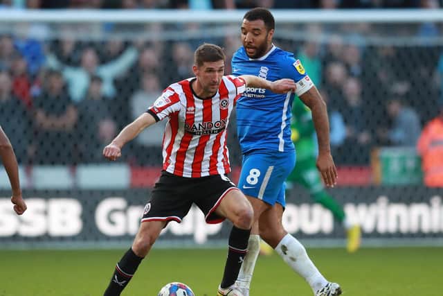 Birmingham City captain Troy Deeney battles Sheffield United's Chris Basham: Simon Bellis / Sportimage