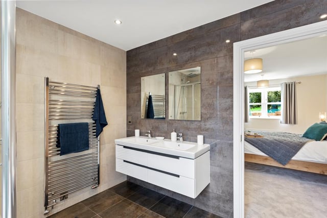 Before we leave the £750,000 Oakerthorpe property, let's take a peek at one of the en suite bathrooms. Smart and stylish.
