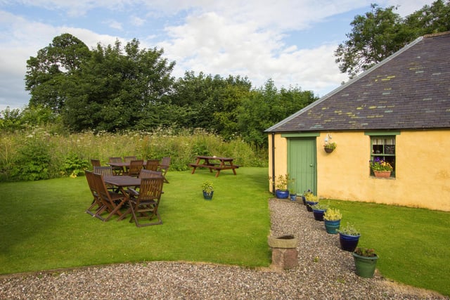 The property boasts a generous garden, which has been well kept
