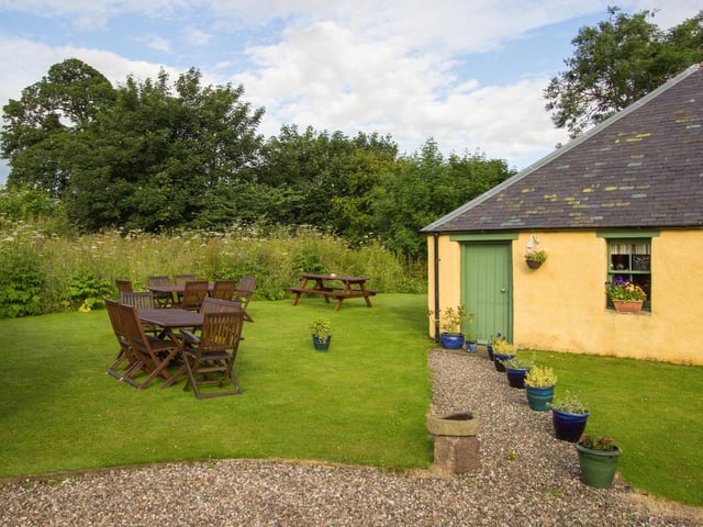 The property boasts a generous garden, which has been well kept