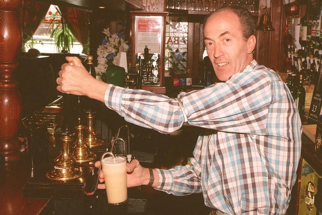 Michael Mason pulling a pint of hand pulled Wards at the Devonshire Arms, on Ecclesall Road, Sheffield, in 1999