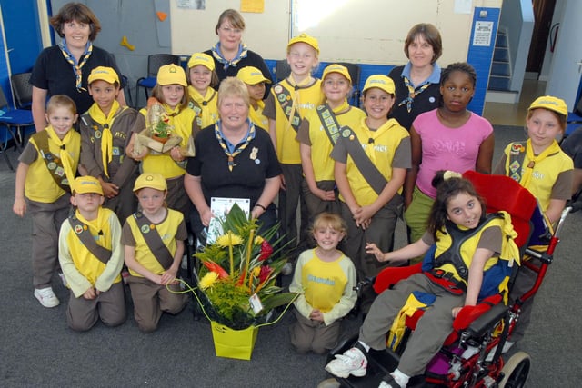 Members of the 105th City of Nottingham Brownies celebrate Brenda Blunt's, seated 50 years service to the Guiding in 2008
