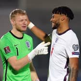 England goalkeeper Aaron Ramsdale - formerly of Sheffield United and now of Arsenal - greets England's Tyrone Mings after the final whistle against San Marino: Nick Potts/PA Wire