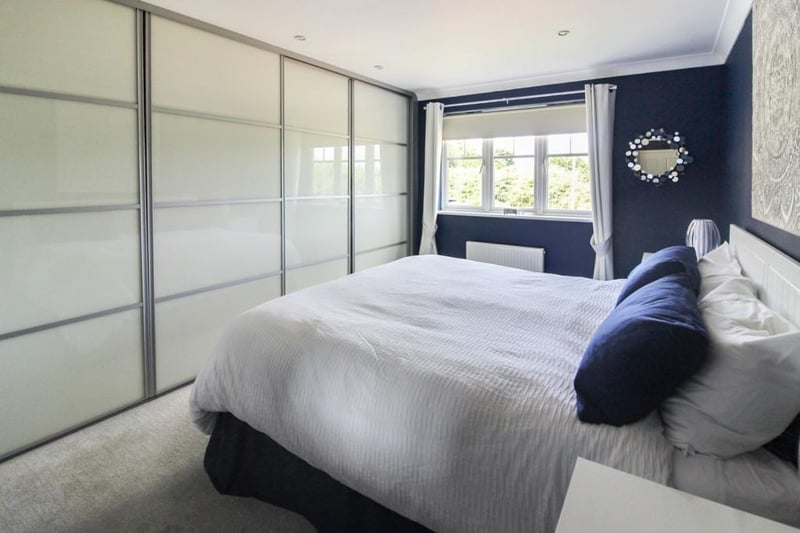 The built-in wardrobes in the bedroom provide ample storage space.