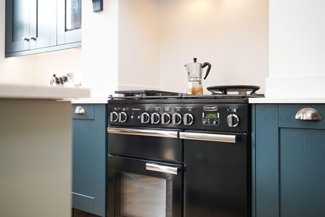 The kitchen is made up of bespoke, handmade units and a range of intergrated appliances.