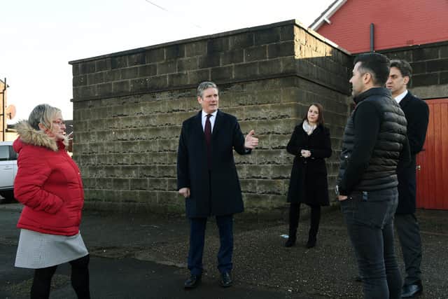 Leader of the Labour Party Keir Starmer visits residents and businesses in Bentley, South Yorkshire, who were affected by last year's floods.
Meeting Shane Miller owner of Custom Windows and Doors.
16th December 2020.
Picture : Jonathan Gawthorpe