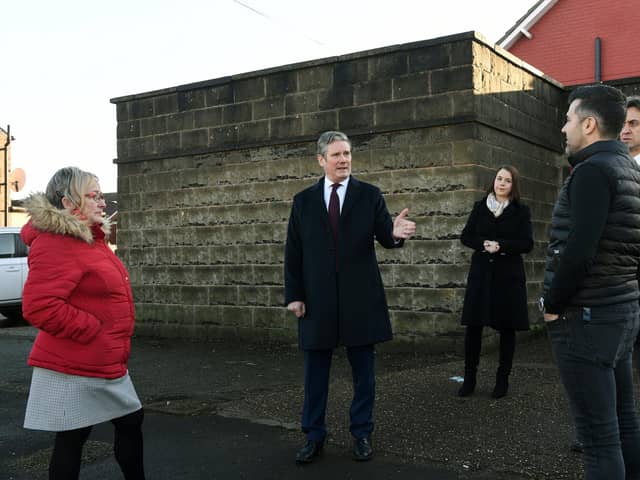 Leader of the Labour Party Keir Starmer visits residents and businesses in Bentley, South Yorkshire, who were affected by last year's floods.
Meeting Shane Miller owner of Custom Windows and Doors.
16th December 2020.
Picture : Jonathan Gawthorpe