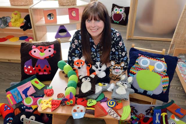 Karen Breen a teaching assistant at Dore Primary School has been self isolating since March. Pictured with a selection of soft toys for the new schools Preschool she has made.