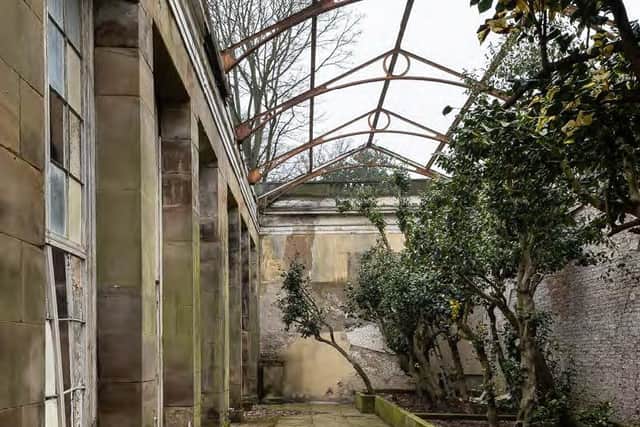 Before: The Camellia House was roofless and derelict