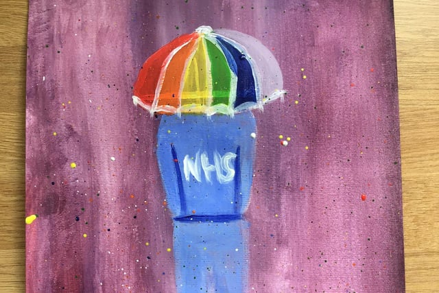 Judge Katherine Renton says: 'This painting by Emily really stands out because it’s unusual and makes you think. This NHS staff worker seems to be standing alone in a storm, this makes me feel sad and worried for this person, it suggests the danger that NHS staff are in during this crisis. Emily has, however, given this nurse an umbrella to protect them in the storm, it acts like a mask. The rainbow colours on the umbrella suggests hope – we can be careful to protect them, and their skills will protect us.'