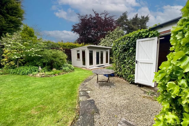 The property also has a garden room at the bottom of this lovely, private, green garden.